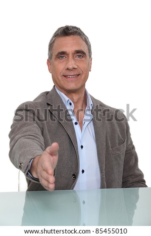 man giving his hand for a handshake