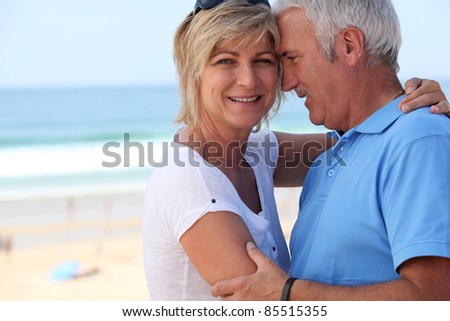 blissful middle-aged couple on holidays
