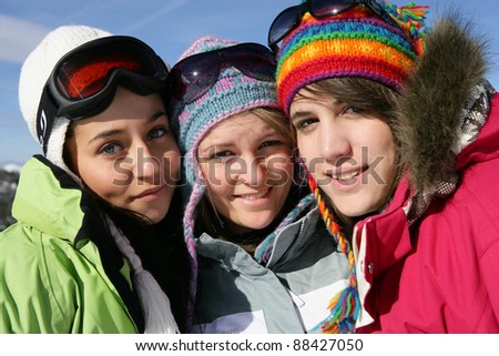 Three friends skiing