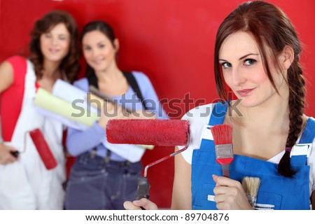 girls painting their new apartment