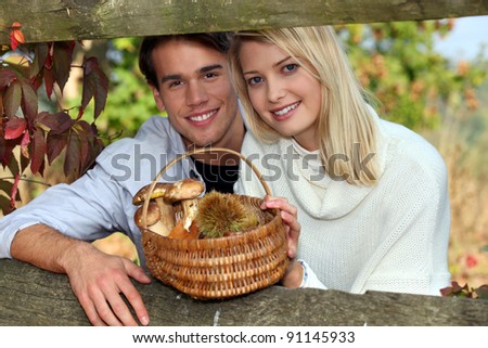 duo behind a hedge
