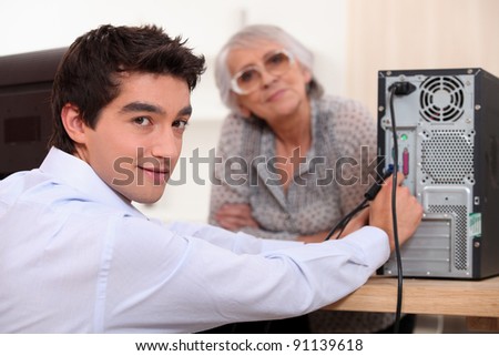 Grandson setting up computer