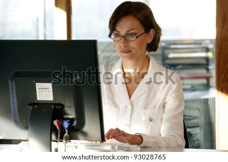Busy female office worker