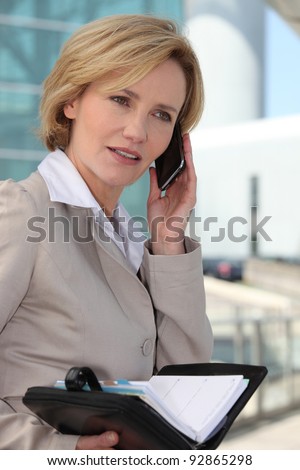 Businesswoman booking an appointment