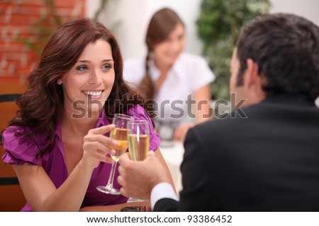 Young couple dating at the restaurant