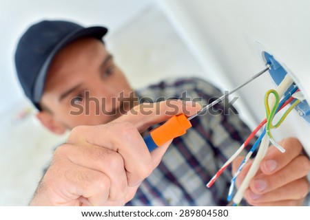 Electrician wiring a new build