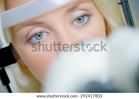 Having her eye sight checked