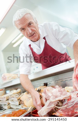 Man working on deli counter