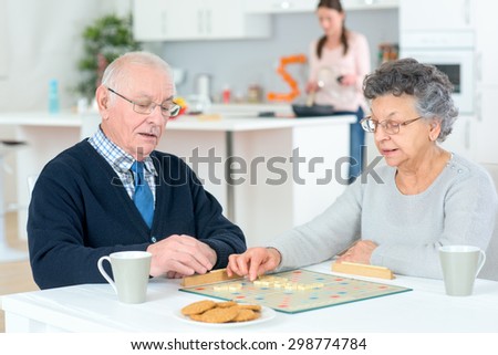Senior couple playing a board game