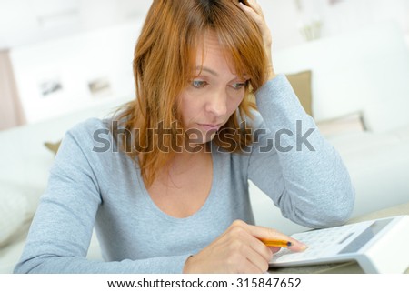 Stressed woman facing financial difficulties