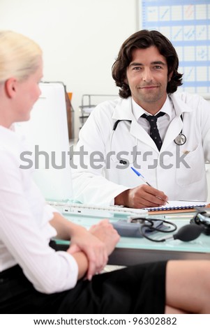 Doctor consulting with a patient
