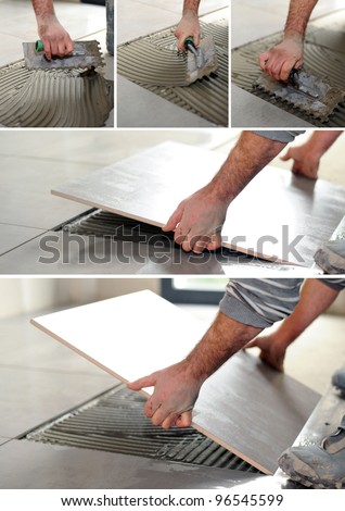 handyman spreading glue on the floor