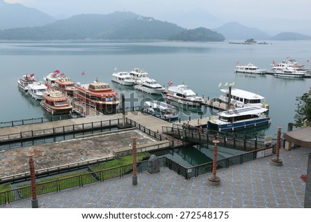 Sun Moon Lake - Apr 11: Shuishe Pier at Sun Moon Lake on April 11, 2015 in Taiwan. This Pier is a famous place that visitors can take a cruise all around Sun Moon Lake.