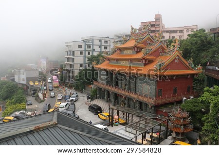 JIUFEN, TAIWAN - APRIL 17, 2015: Fog covered Temple at Jiufen, Ruifang, Taiwan on April 17, 2015. Jiufen is a popular tourist destination for shopping as filmed in City of Sadness and Spirited Away.