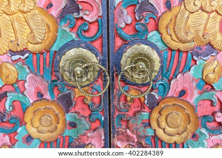 Traditional Colorful Balinese Style Door Knob, made of bronze, in Ubud, Bali, Indonesia.