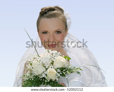 beauty bride in white dress again blue sky