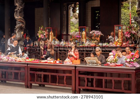 TAIPEI, TAIWAN - APRIL 23:  people pray in Longshan temple in Taipei, Taiwan on April 23th 2015. Longshan Temple worships a mixture of Buddhist and Taoist deities.