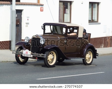 Prague - Zbraslav, Czech Republic - September 06, 2014: Ford - very old American car on the way during veteran race