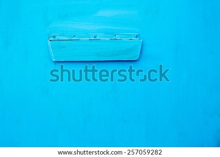Bright Blue Paint on Metal with a postbox