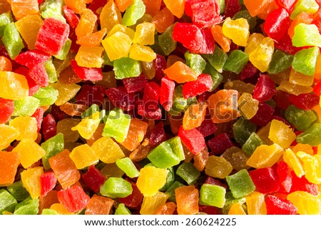 An assorted selection of various coloured dried pineapple chunks and pieces