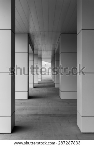 Modern style building blocks supported with diminishing perspective in black and white