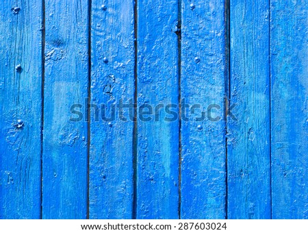 Bright blue retro painted flooring or wall planks