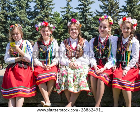 UFA/BASHKORTOSTAN - RUSSIA 13th June 2015 - Five Russian girls in traditional Russian dress enjoy Russia Day holiday in Ufa Bashkortostan in July 2015