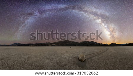 Milky Way Arch over the sliding rock in racetrack playa, Death Valley National Park