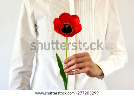 Women with   tulip in the hands