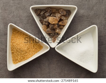 Multiple types of sugar: brown sugar and unrefined and white sugar