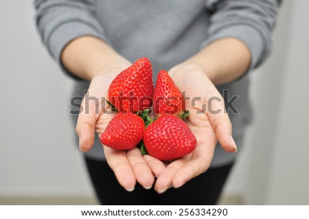 stil life of organic strawberries grouped