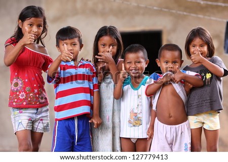 CANAIMA,VENEZUELA-NOV 27:Unidentified children in village showed smiles to the relief team on November 27 2010 in Canaima, Venezuela.People suffers from food shortages due to unstable currency policy.