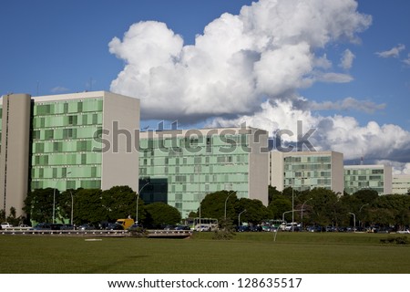 Brasilia, Brazil - February 21: Row Of Ministry Buildings Of Brazil Government On February 21, 2009 In Brasilia, Brazil. A Famous Example Of Modern Urban Planning By Oscar Niemeyer