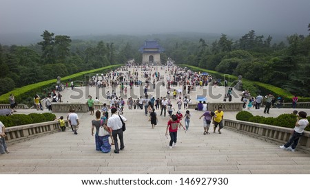NANJING, CHINA - JUL 15: People visit Sun Yat-sen\'s tomb to pay tribute to the founding father of Republic of China on July 15, 2011, in Nanjing, China.