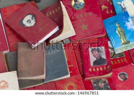 SHANGHAI, CHINA - MAY 4: Mao red books on sales in antique market on May 4, 2011 Shanghai, China. During Mao rule almost every person in china had a red book.