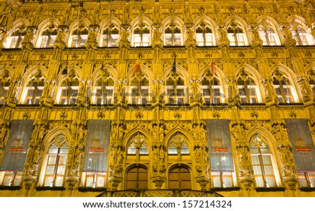 LEUVEN, BELGIUM - NOV 29: The town hall at Grote Market in evening in Leuven, Belgium on November 29, 2012. The Grote Market is one of the busiest squares in this historical university town.