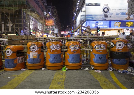 HONG KONG - OCT 15: Barricades are placed in the middle of the road in Mongkok in Hong Kong on October 15 2014. Mongkok is the busiest district in Hong Kong.