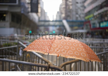 HONG KONG - OCT 15: Barricades are placed in the middle of the road in Causeway Bay in Hong Kong on October 15 2014. Causeway Bay is the busiest district in Hong Kong.