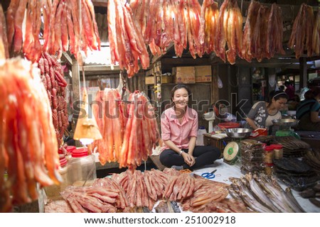 PHNOM PENH, CAMBODIA - NOV 17: The local seller in Toul Tom Poung Market, Phnom Penh, Cambodia on November 17 2014. It is also called Russian Market which is a good place for food and souvenirs.