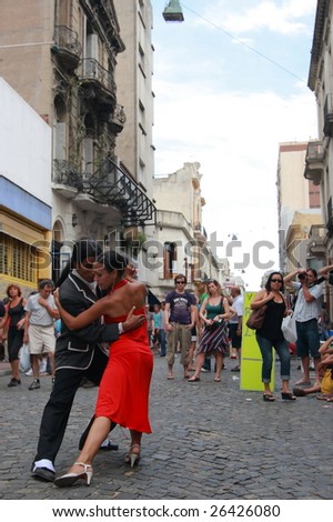 BUENOS AIRES,- FEBRUARY 25: A pair of tango dancers performs in San Telmo in Buenos Aires, Argentina on February 25, 2009. The tango dance originated from Buenos Aires and Montevideo, Uruguay.