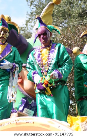 NEW ORLEANS - FEBRUARY 2: People celebrated crazily in Mardi Gras parade. February 2, 2008 in New Orleans, Louisiana.
