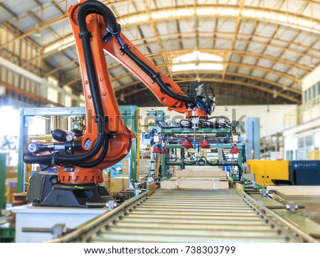 Automatic robotic warehouse with roller conveyor in industrial factory