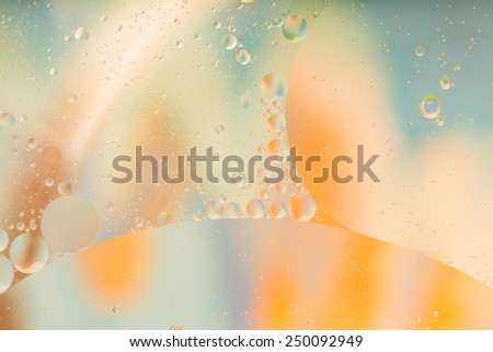 oil droplets on water surface, abstract background