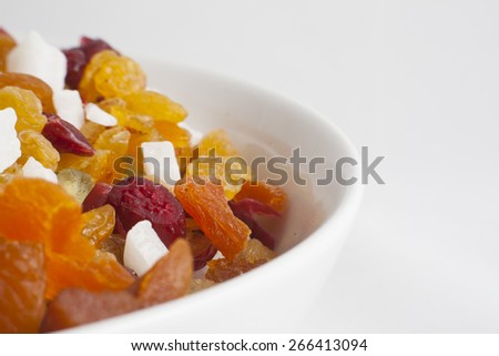 candied fruit in a classic white bowl. Sweet candied fruit closeup