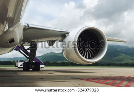 Turbine of engine airplane in airport background.