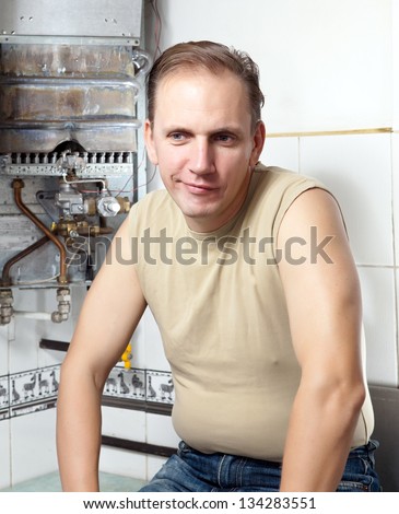 The man is upset, the gas water heater has broken