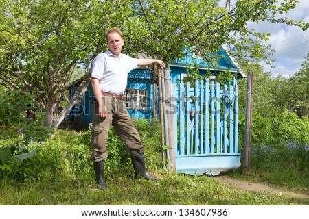 The man at a country house gate