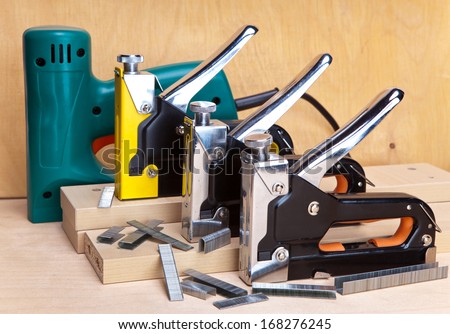The tool - staplers electrical and manual mechanical - for repair work in the house and on furniture, and brackets