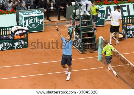 PARIS - JUNE 7: Roger Federer of Switzerland rejoices to win at Tennis tournament French Open, Roland Garros, final game on June 7, 2009 in Paris, France.