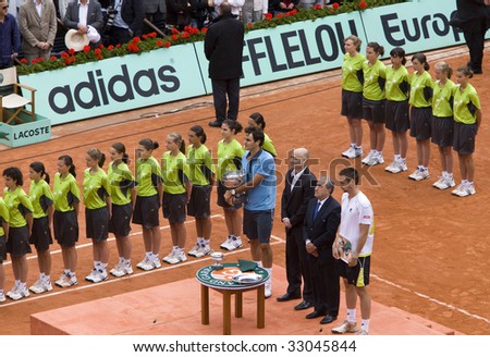 PARIS - JUNE 7: Roger Federer of Switzerland with cup, it received for victory, sounds hymn at Tennis tournament French Open, Roland Garros, final game on June 7, 2009 in Paris, France.